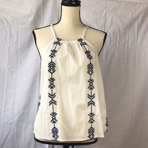 White and navy blue patterned sleeveless top